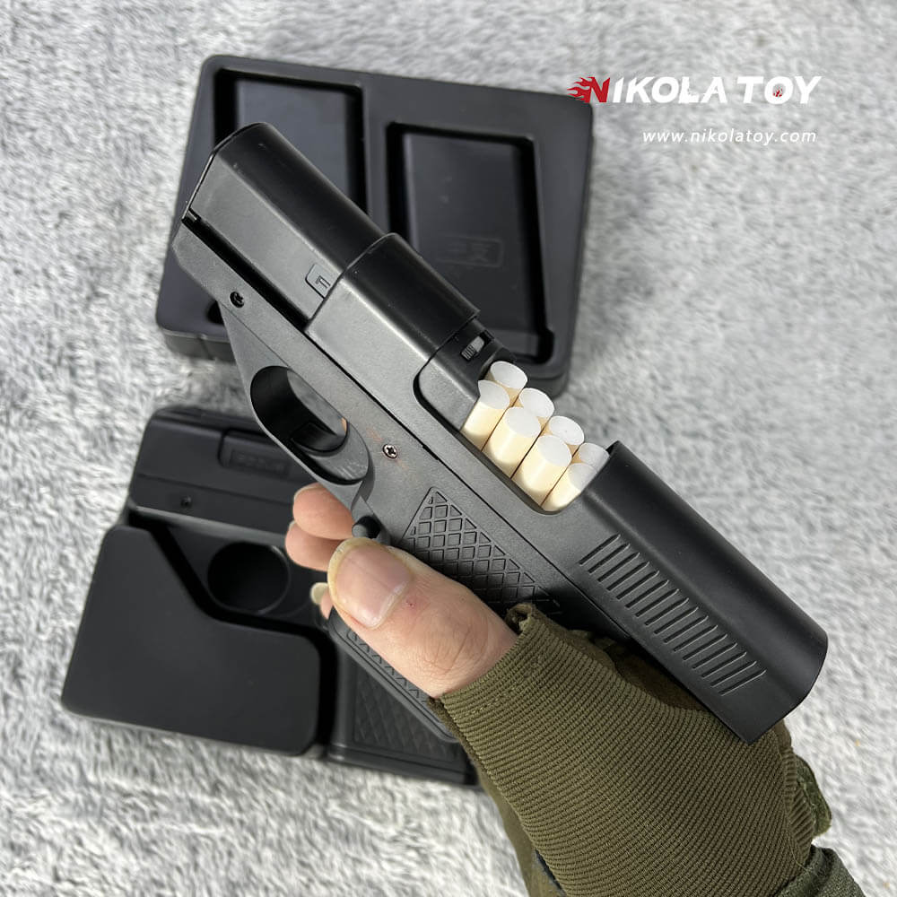 NikolaToy™ Gun type cigarette lighter with 3 replaceable magazine clips