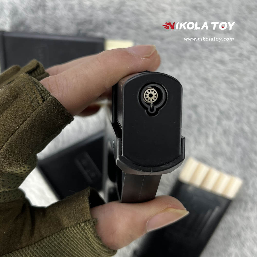 NikolaToy™ Gun type cigarette lighter with 3 replaceable magazine clips