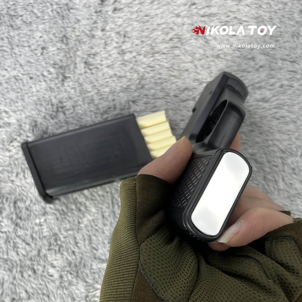 NikolaToy™ Gun type cigarette lighter with 3 replaceable magazine clips